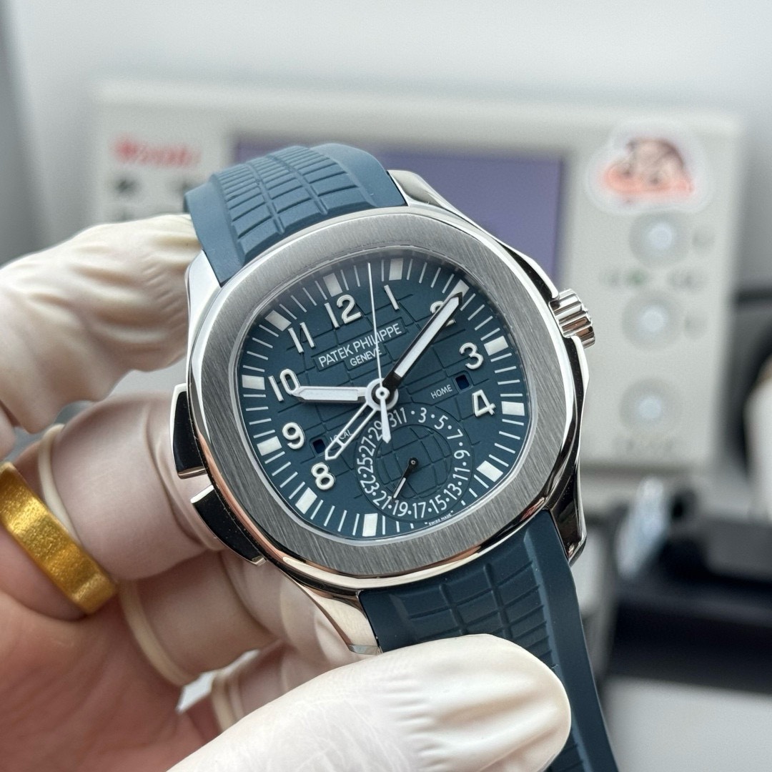 Patek Philippe Aquanaut Travel Time Blue Dial 40mm Ref. 5164G-001 - Image 4