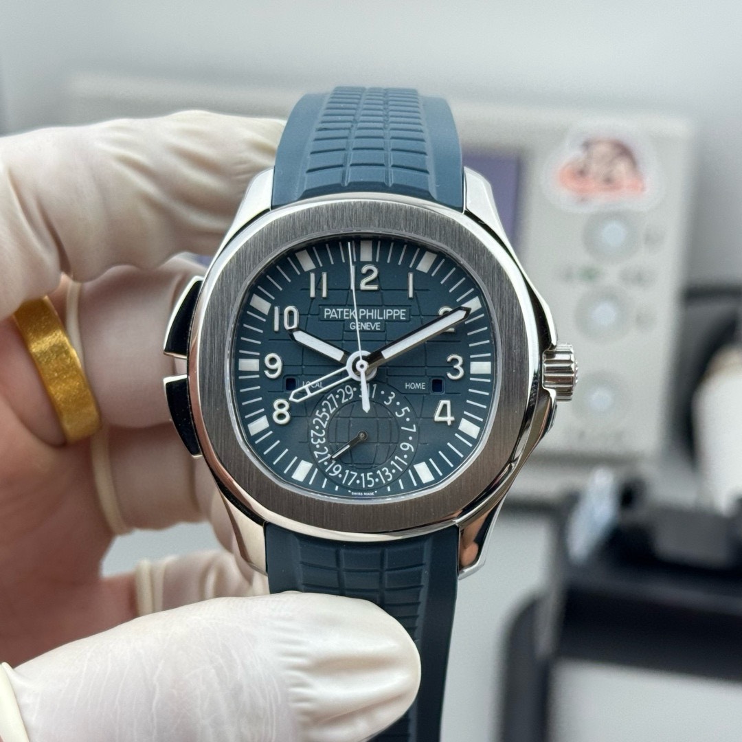 Patek Philippe Aquanaut Travel Time Blue Dial 40mm Ref. 5164G-001 - Image 2